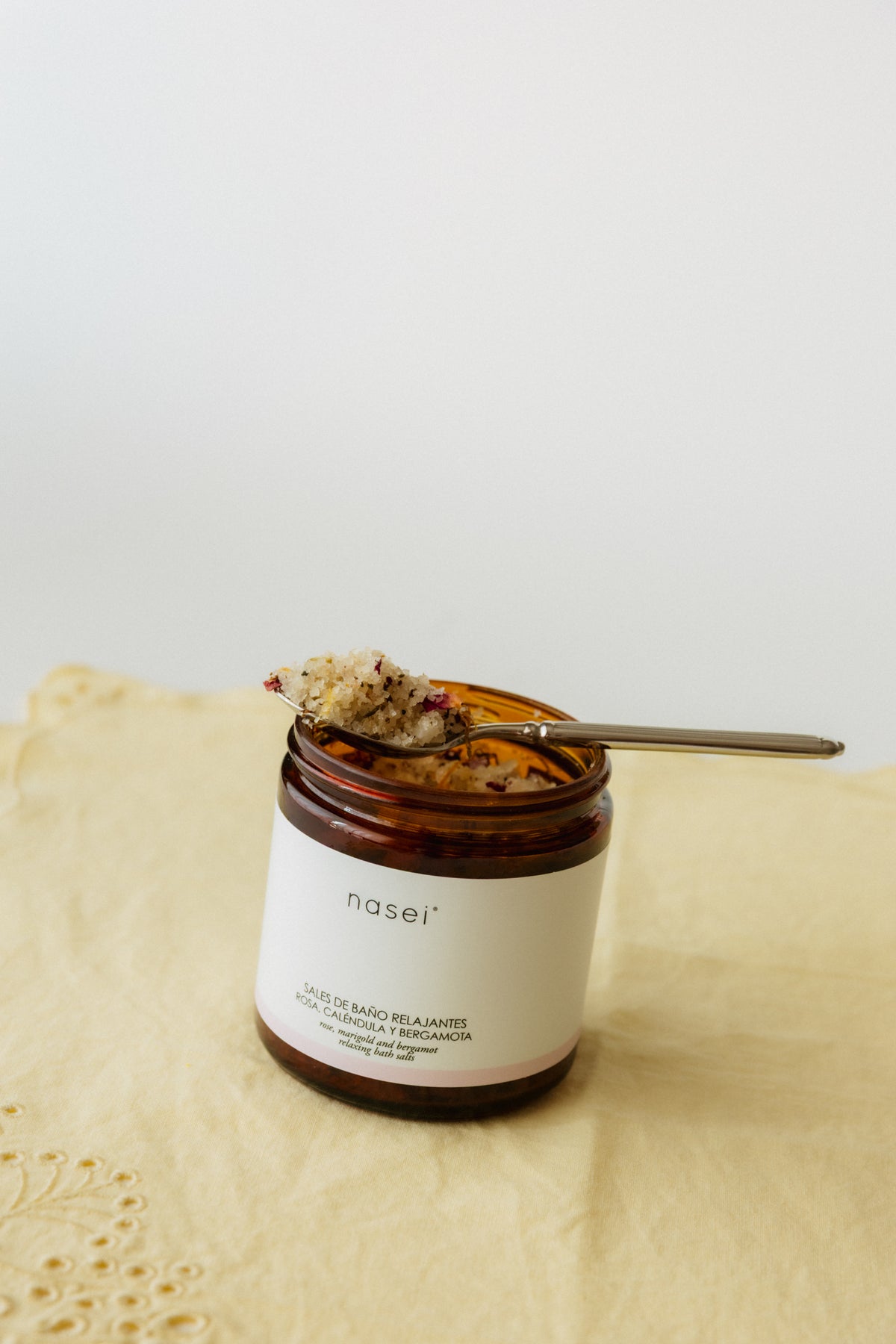 Relaxing bath salts with rose, calendula, and bergamot